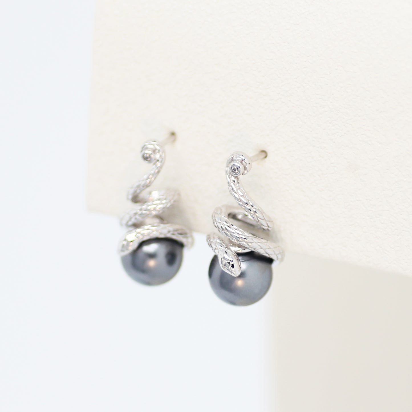 Serpent & Orb Stud Earrings